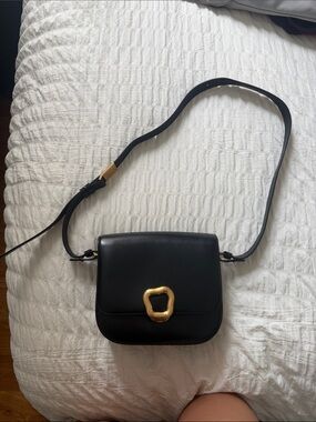 Songmont Black Leather Crossbody with Gold Accent